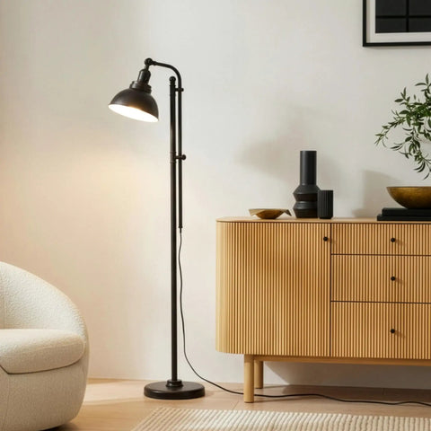 Industrial Floor Lamp With 180 Degree Adjustable Head, Lit LED Reading Light next to a wooden cabinet in a living room