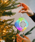 Shower Bluetooth Speaker Waterproof IPX7 With Floating Design and LED Light hanging on a Christmas tree