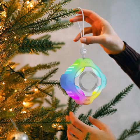 Shower Bluetooth Speaker Waterproof IPX7 With Floating Design and LED Light hanging on a Christmas tree