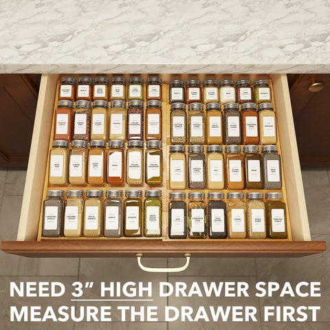 No Sweat Adjustable Bamboo Spice Drawer Organizer Expands To Fit Any Kitchen Cabinet Slot with 48 spice jars neatly arranged.