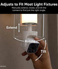 Bulb Cam 2K HD Smart Security Light With Color Night Vision, adjustable E26 socket, hand demonstrating rotation and tilt.