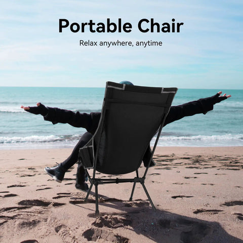 Ultra Lightweight Portable High Back Camping Chair With Head Support 440 Lbs Capacity on beach with open landscape