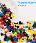 Top Shelf Bulk Push Pins For Bulletin Boards And Cork Walls, Sharp Steel Thumb Tacks With Easy Grip Heads, Multicolor office choice scattered from clear jar.