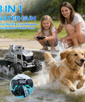 Girl controlling 1:18 Amphibious RC Monster Car For Kids, 4WD Waterproof All Terrain Off Road Boat Stunt Vehicle near dog in water