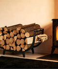 30 Inch Firewood Rack For Indoor And Outdoor Use Beefy Heavy Duty Steel Frame Log Holder near a Fireplace