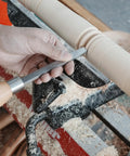 Dead On Precision Cryo Treated M2 High Speed Steel Bead Forming Chisel For Wood Lathe in use on smooth wood with shavings.