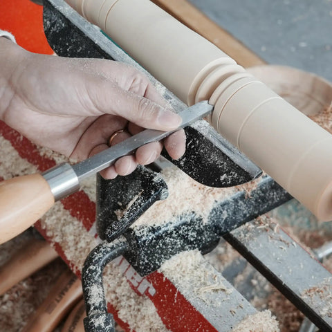 Dead On Precision Cryo Treated M2 High Speed Steel Bead Forming Chisel For Wood Lathe in use on smooth wood with shavings.
