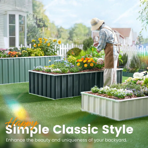 Person gardening in a Sturdy Galvanized Steel Raised Garden Bed Kit 68 x 36 x 12 Inches Outdoor Planter Box dark grey.