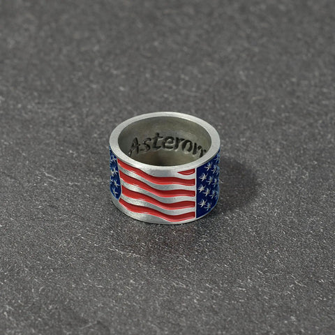 Patriotic American Flag Collar Ring For Walking Canes, 7/8 Inch Inner Diameter, raised star detail, flowing stripe design on gray surface