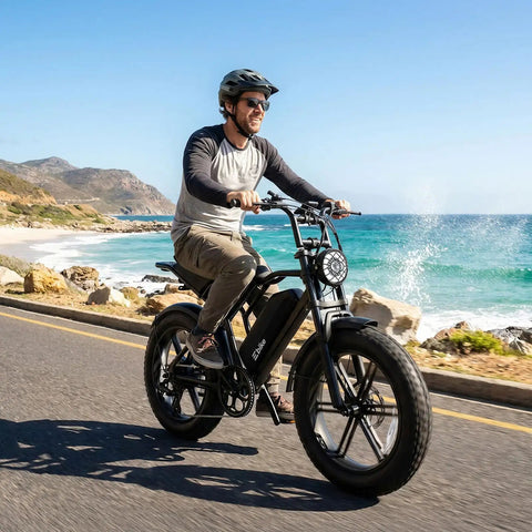 Man riding All Terrain Electric Bike For Adults With 1500W Peak Motor 48V 15Ah Battery 60 Mile Range by the beach