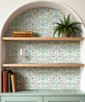 Classic William Morris Style Peel And Stick Wallpaper Removable Self Adhesive Vinyl Roll With Trim Grid For Zero Hassle Home Flip No Drama Waterproof Contact Paper on wooden shelves with books and plants.
