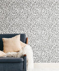 Black and White Confetti Peel and Stick Wallpaper Removable Self-Adhesive Roll for Easy No Mess Decor, wall with couch view.