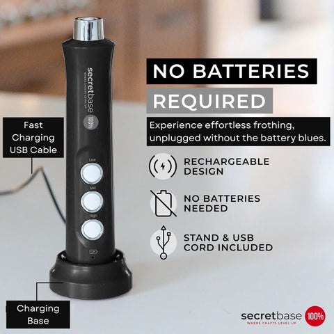 Handheld USB C Rechargeable Milk Frother With 3 Speed Settings And Stainless Steel Double Whisk, black with charging base.