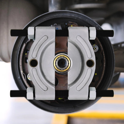 Bearing Puller Kit 14 Piece 5 Ton Automotive Bearing Separator with 2 and 3 Inch Jaws Gear Puller Tool in use on vehicle