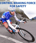 Cyclist descending mountain road, showcasing 4 Pack 44mm Disc Brake Adapter For Bicycle Hubs To 6-Bolt Rotors