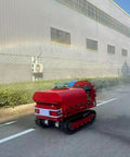 Heavy Duty Crawler Sprayer With Remote Control in red, navigating rough terrain while spraying for farm pest management.