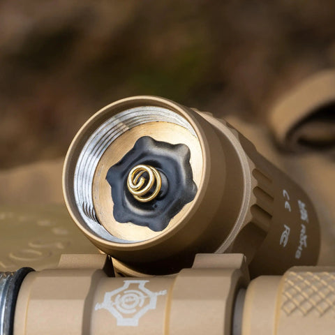 Close-up of LH8 V2 Weapon Light Head Potted 5700K, 128000 CD, 1650 LM, Long Throw 782.38 Yards with gold contact and spring.