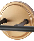 Close-up of gold wall mount and black rod from Modern Black And Gold Vanity Lights Over Mirror, Four Light Bathroom Fixture With Clear Glass Shades