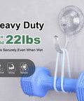 4 Pack Large Suction Cup Hooks For Doors And Windows No Tools No Fuss Wreath Hanger Upgraded 1.9 Inch Diameter Holds Up To 22 Lbs For Front Door Glass Shower Mirrors And Tile holding a blue weight.