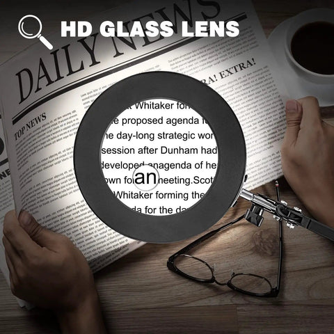 Ultimate Crafting Desk Magnifier Lamp With Light, 8x And 10x Dual Magnification Glass over newspaper text, focus on details.