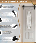 Heavy Duty Sliding Barn Door Hardware Kit With Upgraded Two Point Screw Fixation Modular Track System For A Single Door 30 To 36 Inches Quiet Smooth Sliding Easy To Install shown installed on a white door with high quality bearings.