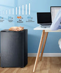 Slick Compact 3 Cubic Feet Upright Freezer In Matte Black Housing with cat resting on top, designed for easy storage.