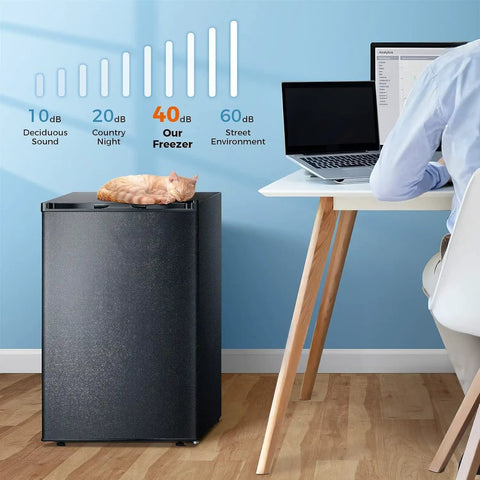 Slick Compact 3 Cubic Feet Upright Freezer In Matte Black Housing with cat resting on top, designed for easy storage.