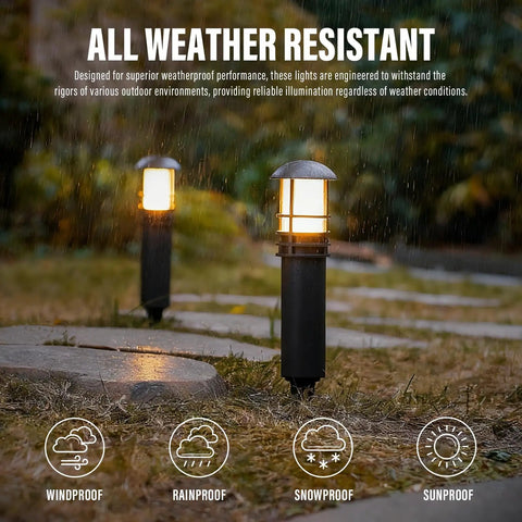 4 Pack Low Voltage Pathway Lights Dope 3W LED Outdoor Landscape Lighting 120 Lumen 3000K Warm White Wired Walkway And Driveway Lights In Black Metal illuminating a garden path in rainy conditions.