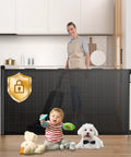 Extra Wide Retractable Baby Gate 33 Inch Tall Extends To 72 Inches Mesh Gate shown with child and dog, kitchen background