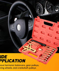 Open case of 13 Piece Harmonic Balancer Steering Wheel Puller Kit for flywheel and crankshaft pulley removal, car interior behind.