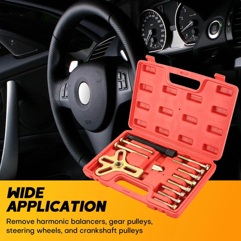 Open case of 13 Piece Harmonic Balancer Steering Wheel Puller Kit for flywheel and crankshaft pulley removal, car interior behind.