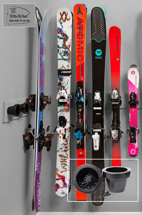 Badass Five Pack Ski Wall Hangers securely grip skis of various styles mounted on a wall, showcasing sturdy plastic construction.