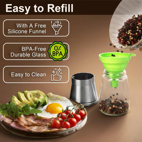 Manual Salt And Pepper Grinder Set With Ceramic Blades, Adjustable Coarseness, Stainless Steel Cap, Refillable Glass Body shown with food