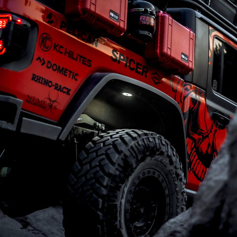 Cyclone V2 LED 5W Flood Beam Light With Clear Lens installed in off-road vehicle wheel well