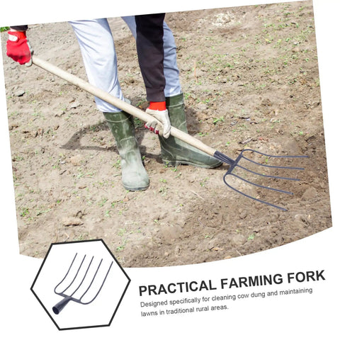 Person using a Practical Manure Fork For Efficient Yard Cleanup And Lawn Care With Durable Iron Pitch Fork Design on soil outdoors