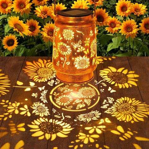 Solar Lanterns Outdoor Hanging Lights Waterproof For Yard Patio Porch Garden LED Decoration With Shepherd Hook Sunflower Pattern Cozy Warm Glow For Nighttime Ambiance Perfect Gift For Women Mom Grandma casting sunflower shadows.
