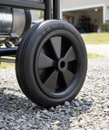 Heavy Duty 7 Inch Solid Tire For Generator And Welder Flat Free Rubber Wheel with anti slip grip on gravel surface.