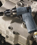 2101XPA 1/4 Inch Mini Impact Wrench compact powerhouse on machinery, high torque burst, rocking dog mechanism, low air use.