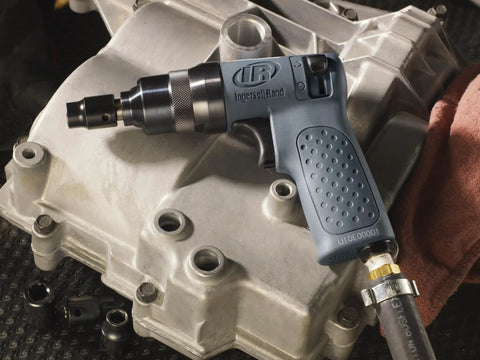2101XPA 1/4 Inch Mini Impact Wrench compact powerhouse on machinery, high torque burst, rocking dog mechanism, low air use.