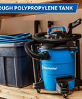 5 Gallon Wet And Dry Shop Vacuum With 3 Peak HP 65 CFM 16 Foot Reach Includes 8 Accessories With Cartridge Dry Filter And Foam Wet Filter VOC507PF in garage