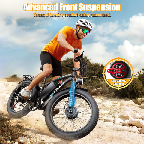 Man riding Beast 9000W Peak Dual Motor Ebike For Adults with 24 Inch Fat Tires Blue Finish on rough terrain