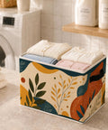 Boho Abstract Botanical Foldable Storage Bins for Home Organization Collapsible Fabric Cubes holding folded clothes on a countertop.