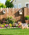 Decorative Garden Fence For Yard And Patio, Rustproof Black Metal Barrier Panels with flowers and small dog in yard