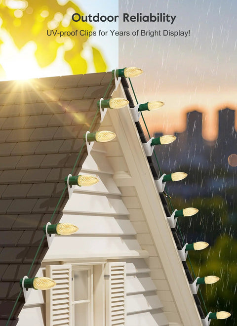 100 Pack Shingle Tab Light Clips For C7 And C9 Christmas Lights With Leaf Guard installed on roof shingles at sunset
