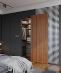 Bedroom showing concealed sliding barn door hardware kit with soft close mechanism on wooden door, wall mount installation visible.