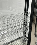 Interior view of Commercial Upright Freezer With Two Swing Glass Doors And Four Side Transparent Panels showcasing shelving.