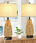 Set Of 2 Rattan Table Lamps With USB Ports, Coastal Woven Bedside Lamps 26 Inch Tall, with cream fabric shades on a wooden desk.