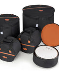 Road Tough Full Size Five Piece Drum Case Set With Killer Thick Padding For 10 Inch 12 Inch Toms 14 Inch Snare 16 Inch Floor Tom And 22 Inch Bass Drum Bags, black fabric with orange accents.