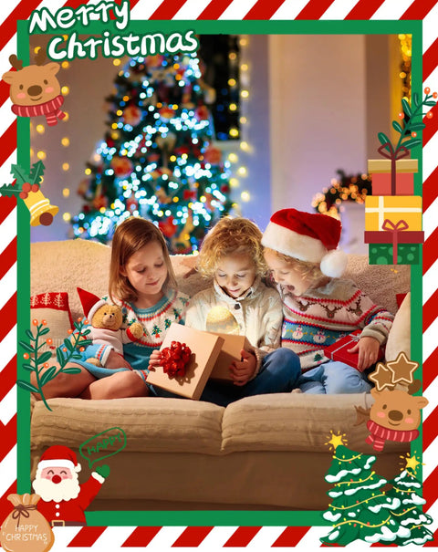 Three children in Christmas sweaters sitting on a couch opening a gift, with a decorated Christmas tree in the background.