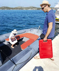 Man carrying Six Gallon Portable Marine Fuel Tank For Outboard Boats With 9.8 Ft Hose And Built In Level Gauge, Dual Vent Cap